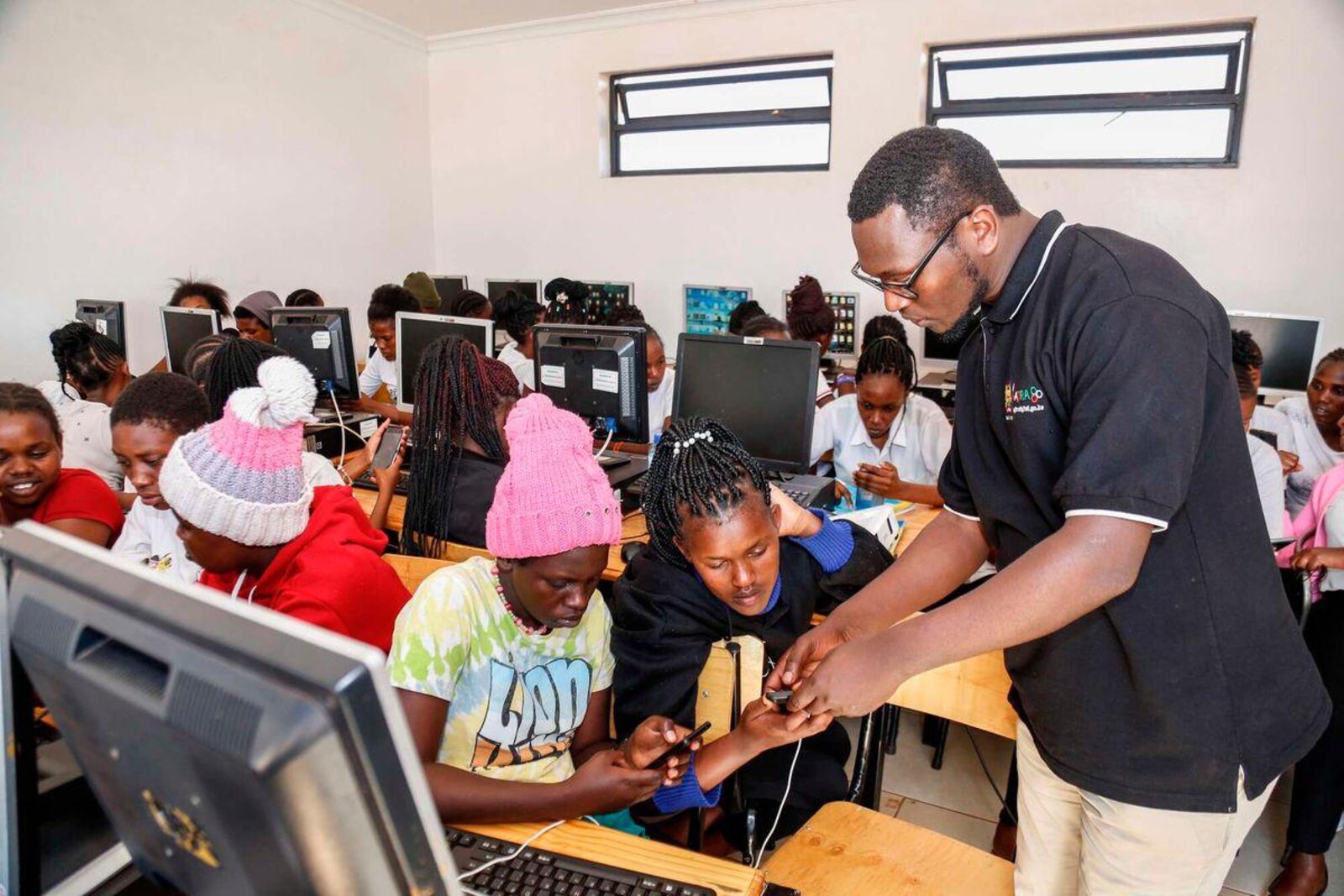 Young people learning in a computer room